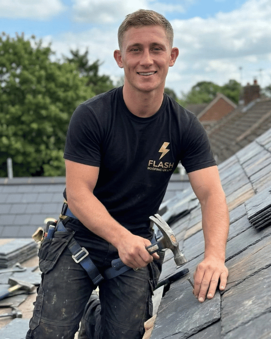 Harry Warden, owner of Flash Roofing UK Ltd, installing a new slate roof in Bury St Edmunds