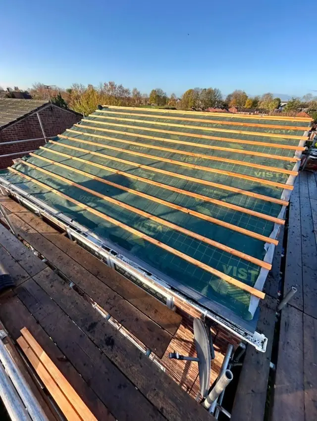 New roof structure and battens over a bungalow